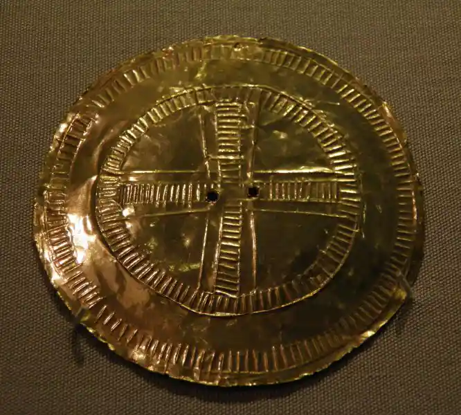 Pre-Christian cross, solar cross, gold disc